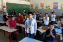 Syrian refugee children attend a class at a school in Mount Lebanon