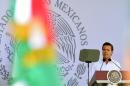 Mexican President Enrique Pena Nieto delivers a speech during an event for National Flag Day in Iguala, Guerrero State, Mexico on February 24, 2016