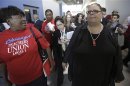 Chicago Teachers Union President Karen Lewis leaves a press conference on the fifth day of their strike in Chicago