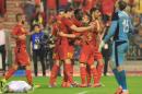 Belgium's Dries Mertens, right, gets congratulations by his team after he scored during a friendly soccer match against Tunisia, at the King Baudouin stadium in Brussels, Saturday, June 7, 2014. Belgium will play against South Korea, Russia and Algeria in Group H of the World Cup 2014 in Brazil. (AP Photo/Yves Logghe)