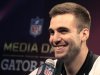 Baltimore Ravens quarterback Joe Flacco answers questions from journalists during Media Day for the NFL's Super Bowl XLVII in New Orleans