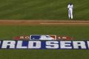 Kansas City Royals pitcher Edinson Volquez walks back to the dugout during Game 1 of the Major League Baseball World Series against the New York Mets Tuesday, Oct. 27, 2015, in Kansas City, Mo. (AP Photo/David J. Phillip)
