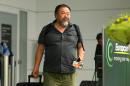 Chinese artist Ai Weiwei leaves the airport in Munich after his arrival from China on July 30, 2015