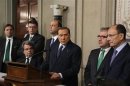 Italy's former Prime Minister Berlusconi speaks to reporters after meeting with Italian President Napolitano at Quirinale palace in Rome