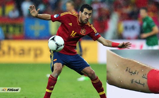 ماذا كتب لاعب إسبانيا على ذراعه باللغة العربية؟؟؟؟؟ 168328214511-jpg_212925