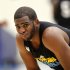 New Orleans Hornets guard Chris Paul reacts during the first day of their NBA basketball training camp in Westwego, La., Friday, Dec. 9, 2011. (AP Photo/Gerald Herbert)