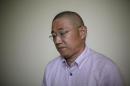 Kenneth Bae, a American tour guide and missionary serving a 15-year sentence, detained in North Korea, speaks to the Associated Press, Monday, Sept. 1, 2014 in Pyongyang, North Korea. North Korea has given foreign media access to three detained Americans who said they have been able to contact their families and watched by officials as they spoke, called for Washington to send a representative to negotiate for their freedom. (AP Photo/Wong Maye-E)