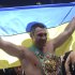 WBC heavyweight boxing champion Vitali Klitschko of Ukraine waves the Ukrainian national flag while celebrating his victory over  Manuel Charr of Germany, after their WBC bout for the heavyweight title in Moscow,  Russia, Sunday, Sept. 9, 2012.  (AP Photo /Kirill Kudryavtsev, Pool)