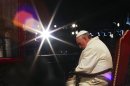 Pope Francis leads the Via Crucis procession during Good Friday at the Colosseum in Rome