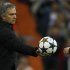 Real Madrid's coach Mourinho hands back ball to Borussia Dortmund player during Champions League semi-final second leg soccer match in Madrid
