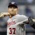 Washington Nationals starting pitcher Stephen Strasburg works against the San Diego Padres in the first inning of a baseball game in San Diego, Thursday, May 16, 2013. (AP Photo/Lenny Ignelzi)