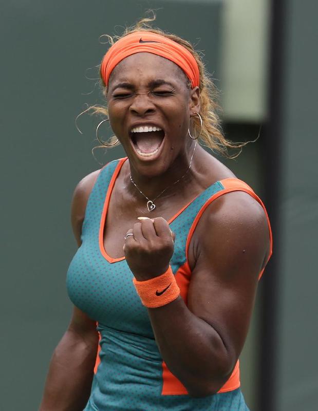 Serena Williams, reacts after breaking service against Li Na, of China, in the first set during the final at the Sony Open Tennis tournament, Saturday, March 29, 2014, in Key Biscayne, Fla