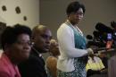 The mother of Sandra Bland, Geneva Reed-Veal (L), and sister Sharon Cooper (R) attend a news conference with attorney Cannon Lambert (C) on July 22, 2015 in Lisle, Illinois