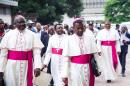 Catholic bishops arrive for the signing of an accord at the inter diocesan centre in Kinshasa on January 1, 2017 following talks launched by the Roman Catholic Church between the government and opposition