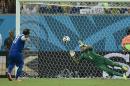 Costa Rica's goalkeeper Keylor Navas, right, makes a save on Greece's Fanis Gekas' penalty shot during a shootout after regulation time in the World Cup round of 16 soccer match between Costa Rica and Greece at the Arena Pernambuco in Recife, Brazil, Sunday, June 29, 2014. Costa Rica defeated Greece 5-3 in penalty shootouts after a 1-1 tie. (AP Photo/Martin Meissner)