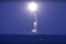 In this photo made from the footage taken from Russian Defense Ministry official web site, Wednesday, Oct. 7, 2015, a Russian navy ship launches a cruise missile in the Caspian Sea. Russia's Defense Minister Sergei Shoigu said four Russian navy ships in the Caspian launched 26 cruise missiles at Islamic State targets in Syria.(Russian Defense Ministry Press Service via AP)
