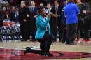 Singer kneels while performing anthem at Miami NBA game