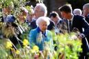 Britain's Queen Elizabeth looks at a display during a visit to the Chelsea Flower Show in London