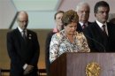 Brazil's President Dilma Rousseff asks for a minute of silence in honor of the victims of the tragedy at The Boate Kiss nightclub in Santa Maria, in Rio Grande do Sul