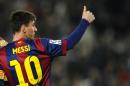 FC Barcelona's Lionel Messi, from Argentina, gestures after scoring against Elche during a round of 16 first leg Copa del Rey soccer match at the Camp Nou stadium in Barcelona, Spain, Thursday, Jan. 8, 2015. (AP Photo/Manu Fernandez)