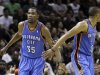 Oklahoma City Thunder small forward Kevin Durant (35) and Russell Westbrook (0) react against the San Antonio Spurs during the first half of Game 1 in their NBA basketball Western Conference finals playoff series on Sunday, May 27, 2012, in San Antonio. (AP Photo/Eric Gay)