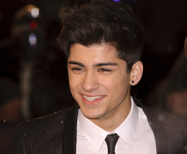 Zayn Malik has been voted the hottest member of One Direction by Yahoo omg