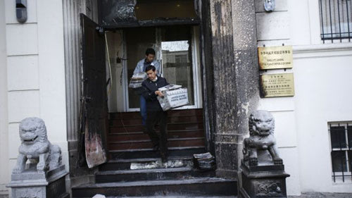 Hiện trường sau vụ đốt phá - Ảnh: Reuters
