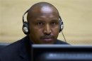 Congolese warlord Bosco Ntaganda looks on during his first appearance before judges at the International Criminal Court in the Hague