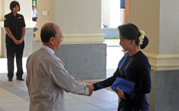 Myanmar president opens unprecedented talks with Suu Kyi, army