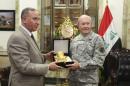 Iraq's Defence Minister Obeidi meets with U.S. Army General Dempsey, chairman of the Joint Chiefs of Staff, at the defence ministry in Baghdad