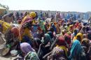 Internally Displaced Persons (IDP) mostly women and children, wait for food at Dikwa Camp, in Borno State, in north-eastern Nigeria