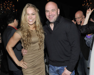 Ronda Rousey and Dana White attend a UFC On FOX VIP Party in 2012. (AP)