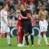 Bayern's Bastian Schweinsteiger (2nd L) embraces teammate and Dutch midfielder Arjen Robben in Munich