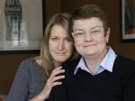 This photo taken Feb. 8, 2013, shows Sandy Stier, left, and Kris Perry, the couple at the center of the Supreme Court's consideration of gay marriage, at their home in Berkeley, Calif.  Whatever the outcome of their momentous case, Perry and Stier, who have been together 13 years, will be empty-nesters as the last of their children will heads off to college. (AP Photo/Jeff Chiu)