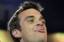 Robbie Williams: Aku Nyaris Pensiun Dari Musik