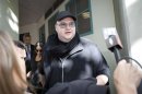 Megaupload founder Kim Dotcom leaves the High Court in Auckland