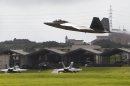 In this Aug. 14, 2012 photo, a U.S. Air Force F-22 Raptor takes off near other fighter jets at Kadena Air Base on the southern island of Okinawa, in Japan. The deployment of a dozen F-22 stealth fighters to Japan has so far gone off without a hitch as the aircraft are being brought back into the skies in their first overseas mission since restrictions were imposed over incidents involving pilots getting dizzy and disoriented, a senior U.S. Air Force commander told the Associated Press on Thursday, Aug. 30, 2012. (AP Photo/Greg Baker)