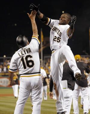 Pirates rally past Cardinals 6-5 in 10 innings