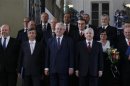 Newly appointed members of the Czech government pose for a group photo after the cabinet's inauguration at Prague Castle
