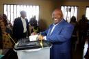 Gabon's President Ali Bongo Ondimba votes during the presidential election in Libreville, Gabon
