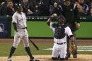 New York Yankees' Granderson reacts after striking out in the seventh inning as Detroit Tigers catcher Laird throws the ball back to the pitcher during Game 4 of their MLB ALCS baseball playoff series in Detroit