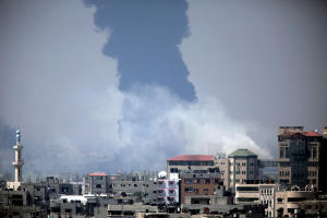 Smoke rises from an Israeli strike at a building in &hellip;