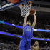 Florida Gulf Coast's Chase Fieler goes up for a dunk against Georgetown's Jabril Trawick during the second half of a second-round game of the NCAA college basketball tournament, Friday, March 22, 2013, in Philadelphia. (AP Photo/Matt Rourke)
