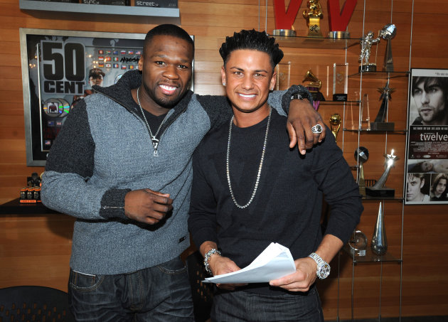 Rapper and businessman Curtis Jackson, also known as 50 Cent, poses with Paul ?DJ Pauly D? DelVecchio from MTV's "Jersey Shore," at the G-Unit Offices, Thursday, Dec. 1, 2011 in New York. DelVecchio signed a record deal with 50 Cent's G-Note record label, which focuses on dance and pop music. (AP Photo/PictureGroup, Brad Barket)