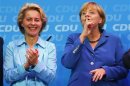 German Labour Minister Von der Leyen and German Chancellor Merkel celebrate after German general election at CDU headquarters in Berlin