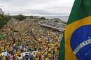 Demonstrators attend a protest against Brazil's President Dilma Rousseff near the Rio Negro river in Manaus