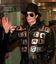 FILE - In this Feb. 22, 1998 file photo, U.S. pop star Michael Jackson waves after arriving at the Kimpo Airport in Seoul to attend the inauguration ceremony for President-elect Kim Dae-jung and also discuss plans for a benefit concert to aid starving North Korean children. David Fournier, a nurse anesthetist who treated Jackson between 1993 and 2003 told a Los Angeles jury on Thursday July 25, 2013, in a civil case against AEG Live filed by Jackson’s mother, that the singer had a high tolerance for anesthesia and was not always forthcoming with his medical history. Fournier said he stopped working on Jackson after the singer seemed unfit to undergo cosmetic surgery in 2003. (AP Photo/Ahn Young-joon, File)