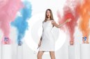 This screen grab provided by Target shows an advertisement from the company featuring a model interacting with baking products. Target is pushing its food, laundry detergent and other groceries in a national ad campaign that pokes fun at high-fashion advertising by featuring models interacting with everyday products. (AP Photo/Target)