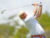 Daly of the U.S. watches his tee shot on the first hole during the third round of the PGA Championship golf tournament at The Ocean Course on Kiawah Island