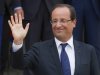 France’s President Francois Hollande, waves to the media during a joint statement with Greece's Prime Minister Antonis Samaras at the Elysee Palace, Paris, Saturday, Aug. 25, 2012. (AP Photo/Michel Euler)